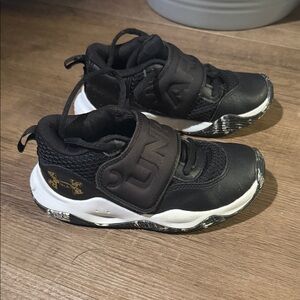 Under Armour Black & White Kids Sneakers with Gold Accent